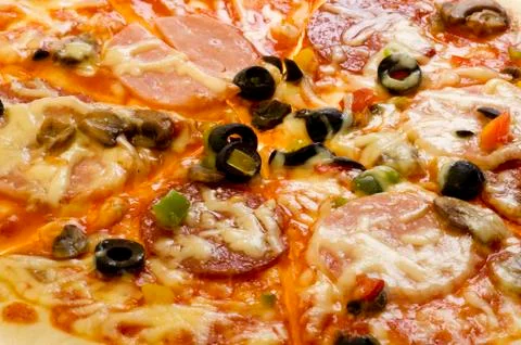 Cutting pizza macro Stock Photos