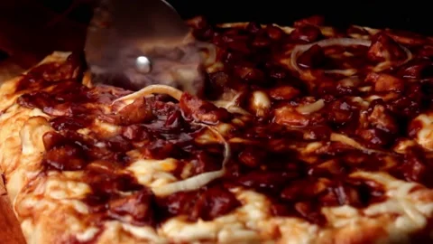Cutting pizza pan Stock Footage