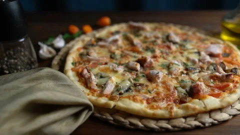 Cutting pizza into pieces, close-up Stock Footage 87870958