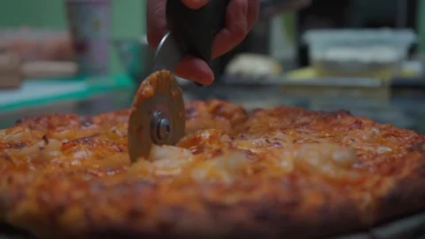 Cutting a Pizza with Precision and Style Stock Footage 293261954