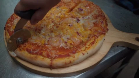 Cutting a Pizza Ready to Savor Stock Footage 293262020
