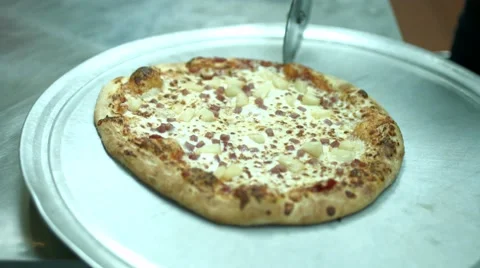 Cutting Pizza Slices Stock Footage 49130804