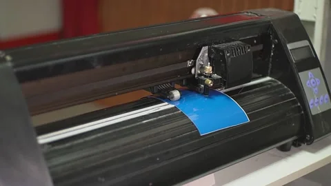 Cutting plotter and red film Stock Footage 226339075