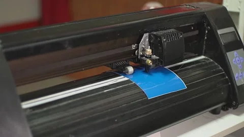 Cutting plotter and red film Stock Footage 226727407