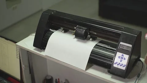 Cutting plotter and red film Stock Footage 228712966