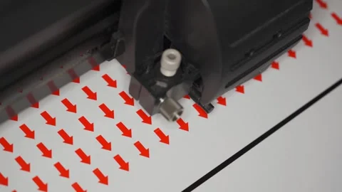 Cutting plotter machine making small round red arrows stickers, closeup detai Stock Footage 292315438