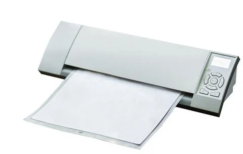 Cutting plotter. Paper cut machine for scrapbook isolated on white background Fotos de archivo