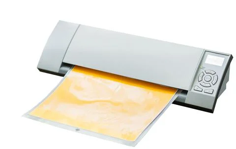 Cutting plotter. Paper cut machine for scrapbook isolated on white background Fotos de archivo