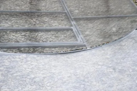 Cutting polycarbonate when installing it on the frame elements of the greenho 写真素材