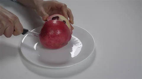 Cutting a pomegranate. 4K UHD 스톡 동영상 48337873