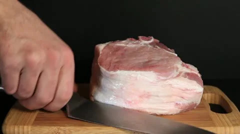 Cutting pork meat Stock Footage 10831943