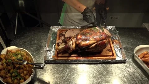 Cutting pork pice on a party 库存影片 130863406