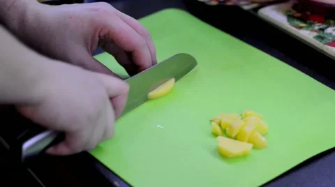 Cutting potato cubes Stock Footage 68319030