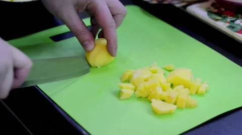 Cutting potato cubes Stock Footage 68319038