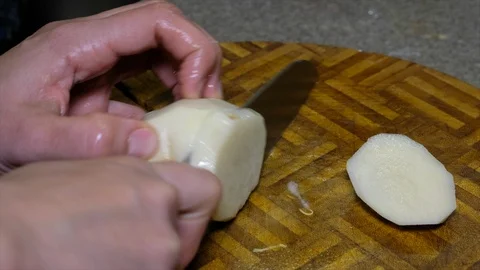 Cutting Potato Stock Footage 101993163