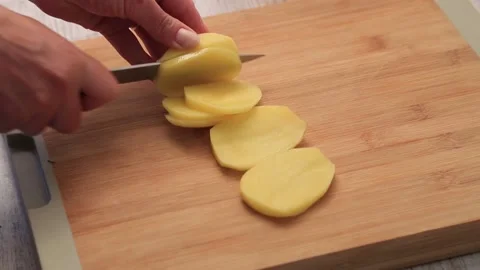 CUTTING POTATO Stock Footage 155653368