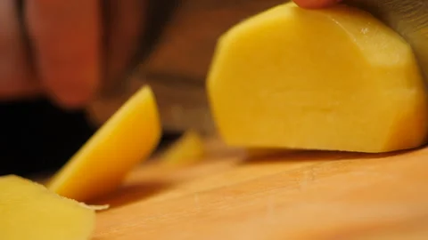 Cutting potato with a knife. Stock Footage 271500425
