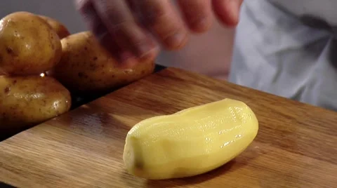 Cutting a potato into sticks Stock Footage 8573642