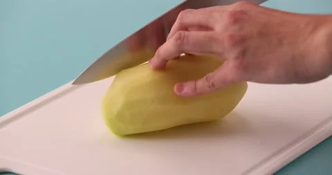 Cutting up potatoes 3 Video stock 132193633