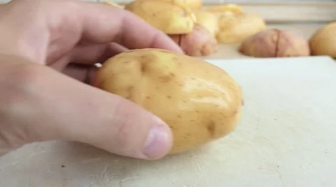 Cutting of potatoes, close-up Stock Footage 68618315