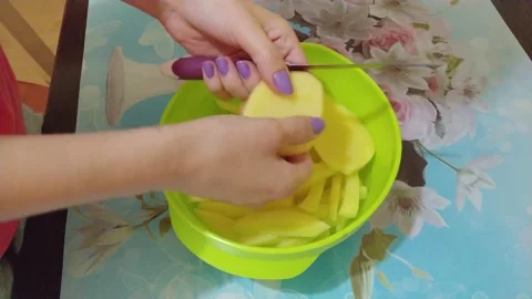 Cutting potatoes Stock Footage 134345046