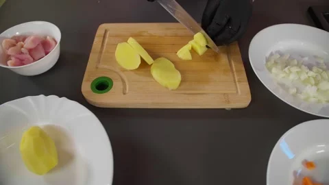 Cutting potatoes the general plan Video stock 268576276