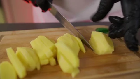 Cutting potatoes large Video stock 268576271