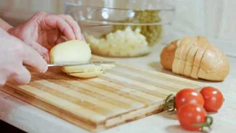 Cutting potatoes for olive salad, Russian salad Stock Footage 144428873