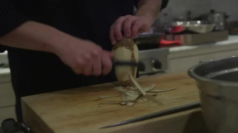 Cutting potatos Stock Footage 99615108