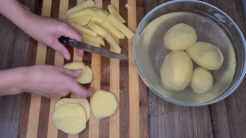 Cutting Potatos Stock Footage 165504732