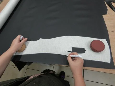 Cutting preparing black leather or synthetic material for custom car interior Stock Photos