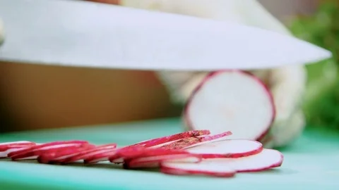Cutting radish, slice Stock Footage 77267447