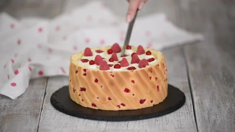 Cutting a raspberry mousse, French dessert. Stock Footage 150061478