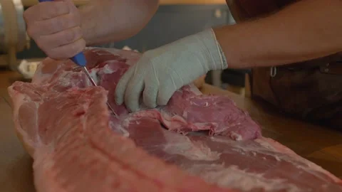 Cutting Raw Big Pork Stock Footage 137900257