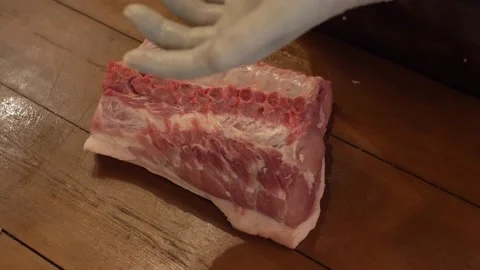 Cutting Raw Big Pork Stock Footage 137900310