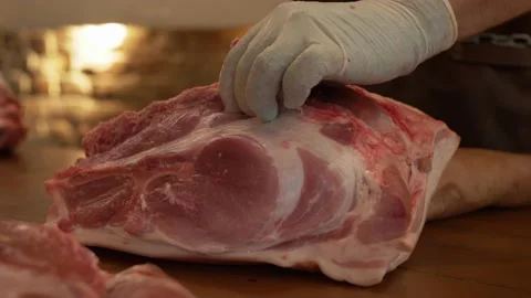 Cutting Raw Big Pork Stock Footage 137900491