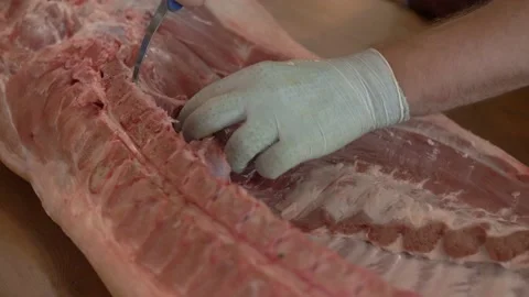Cutting Raw Big Pork Stock Footage 137900758