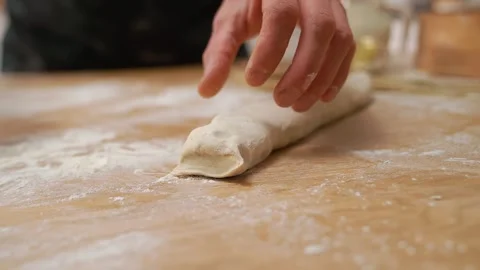 Cutting Raw Dough Stock Footage 273500393