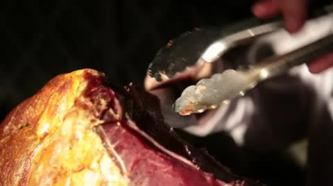 Cutting raw ham Stock Footage 11858774