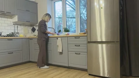 Cutting Raw Potatoes On Board For Cooking Stock Footage 344249648