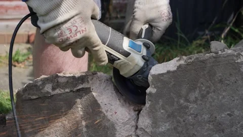 Cutting rebar with an angle grinder in slow motion Stock Footage 275297853