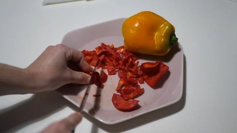 Cutting red bell pepper cute hexagonal plate woman hands Stock Footage 117617677