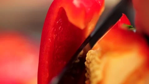 Cutting red bell pepper in slow motion Stock Footage 149118663