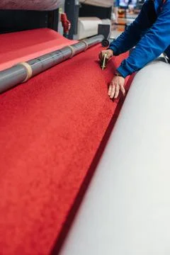 Cutting Red Carpet Material Stock Photos