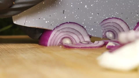 Cutting Red Onion into Delicate Half-Moons Stock Footage 311391081