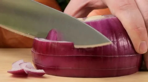 Cutting a red onion Video stock 22270411