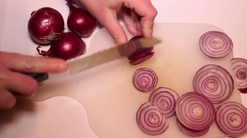 Cutting Red Onion Stock Footage 73587781