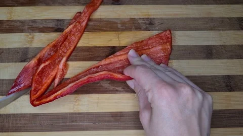 Cutting A Red Pepper And Preparing Healthy Food. Stock Footage 165542540