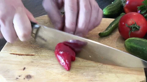 Cutting a red pepper Stock Footage 48136730