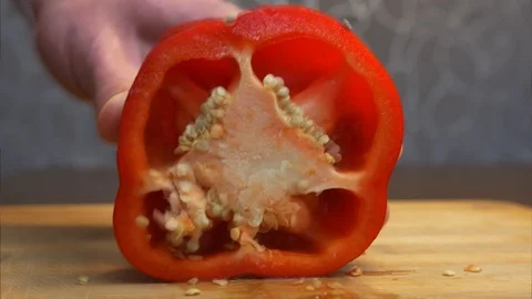 Cutting Red Pepper into Slices Stop Motion Animation Video stock 115987967